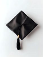 Black graduation cap with tassel isolated on white background, symbolizing academic achievement and educational milestone.