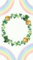 St Patricks Day watercolor wreath with leprechaun hats, gold pots and shamrock clover leaves on rainbow background for Irish holiday celebration cards.