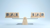 Wooden balance scale with business icons showing equilibrium between law, finance and commerce concepts for decision making and justice.