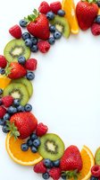 Fresh mixed berries and fruit slices arranged on white background with copy space for healthy eating and nutrition concepts.