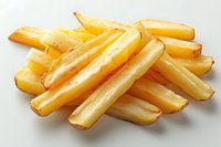 Golden crispy french fries arranged in pile on white background, close up view of fresh hot potato strips with subtle oil sheen and light browning on edges.