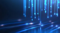 Glowing blue light streaks and particles falling in dark space create futuristic technology background with reflective surface and motion blur effects.