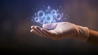 Businessperson holding glowing gears and cogs above open palm, representing innovation, technology, engineering, and digital transformation solutions for corporate business concepts.
