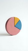 Colorful pie chart model with pink yellow and blue segments on white background for business presentations and data visualization concepts.