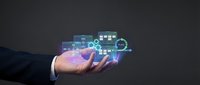 Businessman hand holding glowing digital technology interface with connected icons and data visualization for innovation, software development, and business solutions.