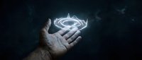 Hand holding glowing circular arrows symbol representing recycling, sustainability and renewable energy concepts for environmental business presentations.