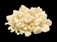 Diced white cheese cubes and crumbles isolated on transparent background, ready for food design, cooking blogs, recipe graphics, print-on-demand products and culinary illustrations.