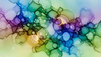 Abstract colorful ink blots flowing in water creating organic shapes with vibrant blue, green, purple and yellow hues for creative design projects.