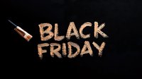 Glowing copper metallic text Black Friday written on dark background with makeup brush, creative seasonal sale concept for social media and advertising.