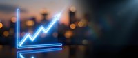 Glowing neon blue upward trending arrow chart against blurred city lights background representing business growth, financial success and market analytics.