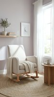 Serene nursery corner with beige rocking chair, wooden side table, potted plant, stacked books, framed moon artwork, and sheer white curtains by bright window for calming interior design.