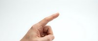 Male hand pointing finger gesture isolated on white background for presentations and graphic design projects.