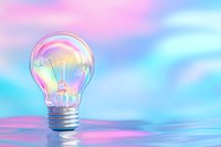 Iridescent light bulb on pastel pink and blue background with soft reflections, creative concept for innovation and bright ideas in modern design.
