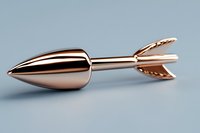 Metallic rose gold arrow with sleek modern design on light gray background, featuring smooth polished surface and minimalist geometric form.