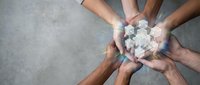 Group of diverse hands joining together holding glowing digital cubes, symbolizing teamwork, collaboration, technology integration, and unified business strategy for corporate projects.