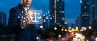 Professional businessman touching digital justice scale interface with network connections against urban cityscape background at night.