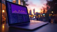 Laptop displaying financial analytics dashboard with purple graphs against blurred city sunset background, creating modern business atmosphere at dusk.