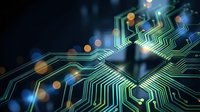 Glowing circuit board pathways with golden bokeh lights and digital connections representing technology, data flow, and artificial intelligence networks.