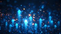 Glowing blue arrows pointing upward with sparkles and bokeh effects on dark background, representing growth, success and digital transformation.