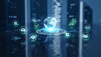 Global digital network with holographic earth and technology icons floating above futuristic cityscape for business connectivity solutions.