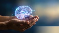 Glowing digital brain hologram floating above cupped hands with neural network connections and light effects for technology and AI concepts.