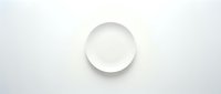 Empty white ceramic plate on clean white background isolated for kitchen dining restaurant menu design mockup presentation.