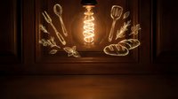 Vintage Edison bulb illuminating kitchen utensils and bread sketches on wooden background, creating warm culinary atmosphere for restaurant design.