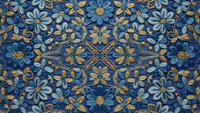 Ornate floral seamless pattern with blue and gold flowers on dark background. Decorative textile design for wallpaper, fabric and wrapping paper applications.