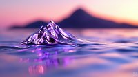 Water drop splash creating mountain peak shape in purple and pink sunset lighting, macro photography with reflection on calm surface and dreamy bokeh background.