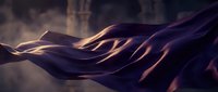 Flowing purple silk fabric with golden light reflections creating elegant waves and smooth textures for luxury fashion and textile design projects.