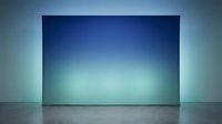 Minimalist interior with large blue gradient wall panel and concrete floor, suitable for modern design, advertising, and architectural visualization projects.