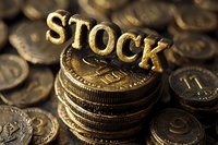 Golden word STOCK on stack of coins with shallow depth of field, representing financial market and investment concept for business presentations.
