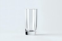 Empty transparent glass on light gray background with soft shadow, minimalist composition for beverage and drink photography, isolated product shot.