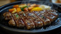 Grilled beef steak sliced on hot cast iron plate with colorful vegetables. Restaurant quality meat dish for culinary and food service concepts.