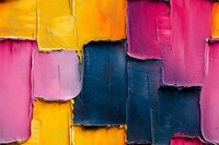 Vibrant abstract oil painting with thick textured brushstrokes in pink, yellow and navy blue creates modern geometric composition with bold impasto technique.