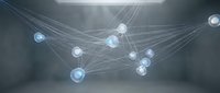 Connected glowing spheres linked by luminous lines form an abstract network structure in a modern digital environment, representing data connectivity and communication systems.