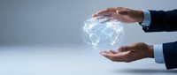 Businessman holding glowing digital globe network between hands, representing global connectivity, international business, technology innovation, and worldwide communication solutions.