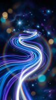 Abstract flowing light trails in blue and purple colors with bokeh effects on dark cosmic background for digital art and technology designs.