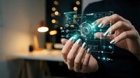 Hands holding transparent smartphone with holographic interface displaying futuristic technology elements and digital data visualization in modern office.