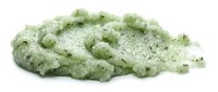 Pile of green sea salt crystals with mineral texture isolated on white background, suitable for spa, wellness, and cosmetic product design.