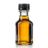 Small glass bottle with amber liquid and black screw cap on white background, isolated product photography for beverage, cosmetic or medicine packaging design.