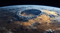 Aerial view of massive impact crater on Earth surface from space showing dramatic landscape with golden sunlight illuminating desert terrain and atmosphere.