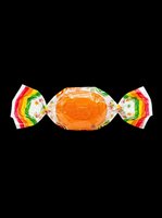 Wrapped orange candy with colorful floral wrapper, isolated on transparent background, ready for stickers, clipart, t-shirt design, and print on demand use.