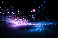 Magical glowing particles in motion with pink and blue light effects against dark background, creating ethereal atmosphere for fantasy designs.