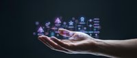 Hand holding glowing digital technology icons including cloud computing, database, security and network symbols on dark background for business concepts.