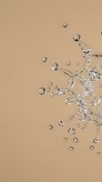 Clear water splash with droplets and bubbles on beige background creating dynamic motion effect for refreshing beverage and hydration concepts.