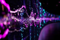 Abstract digital wave visualization with glowing pink and blue light particles flowing through dark space, creating dynamic motion trails and bokeh effects.