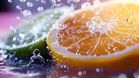 Fresh orange slice with water drops and splashes in macro photography, vibrant citrus fruit with lime on dark background showing juicy texture and refreshing mood.