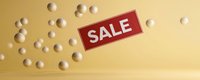Red sale sign floating with cream spheres on golden background, minimalist retail promotion design for seasonal discounts and special offers.