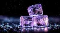 Glowing purple ice cubes with magical sparkles on dark reflective surface against black background. Frozen crystal blocks with ethereal light effects and bokeh.